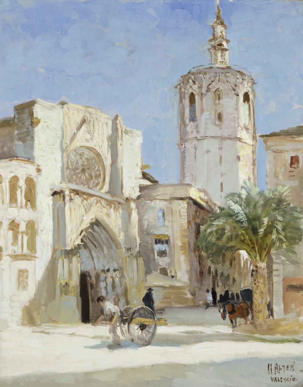 White building on left, tower in background on right.