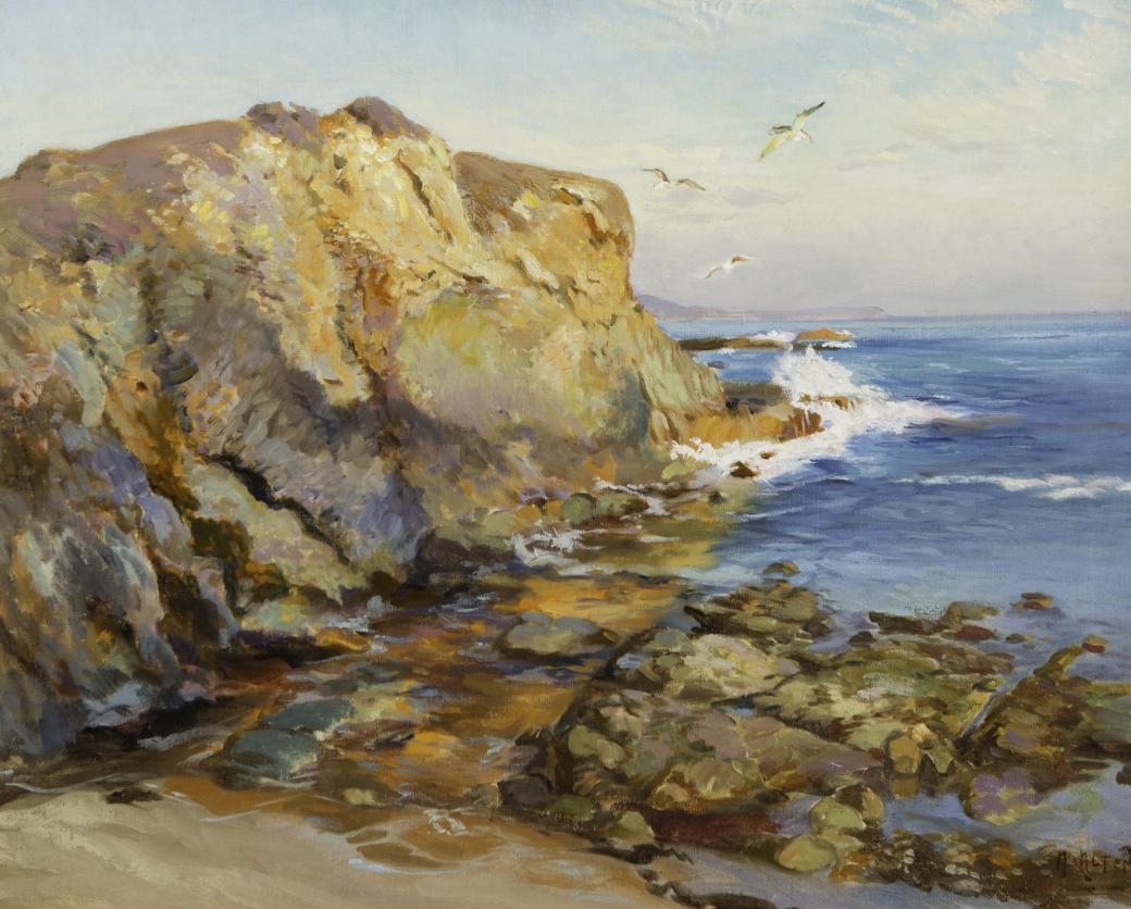 Sea scene of rocky waterfront.