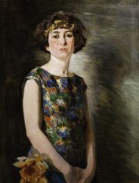 Woman with colorful dress; orange flower by her right hip.
