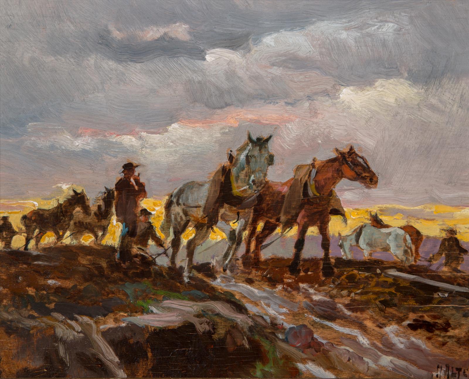 Silhouette of horses in a work field with a yellow sunset under a gray, overcast sky in the background.