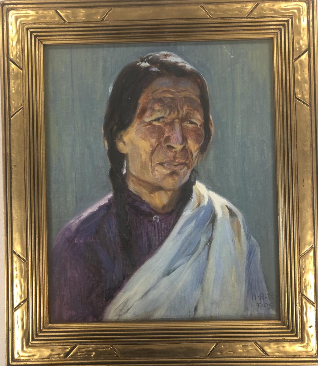 Oil on canvas on board framed painting of a portrait of a man with long braided hair, a purple/red shirt with a white cloth over one shoulder.