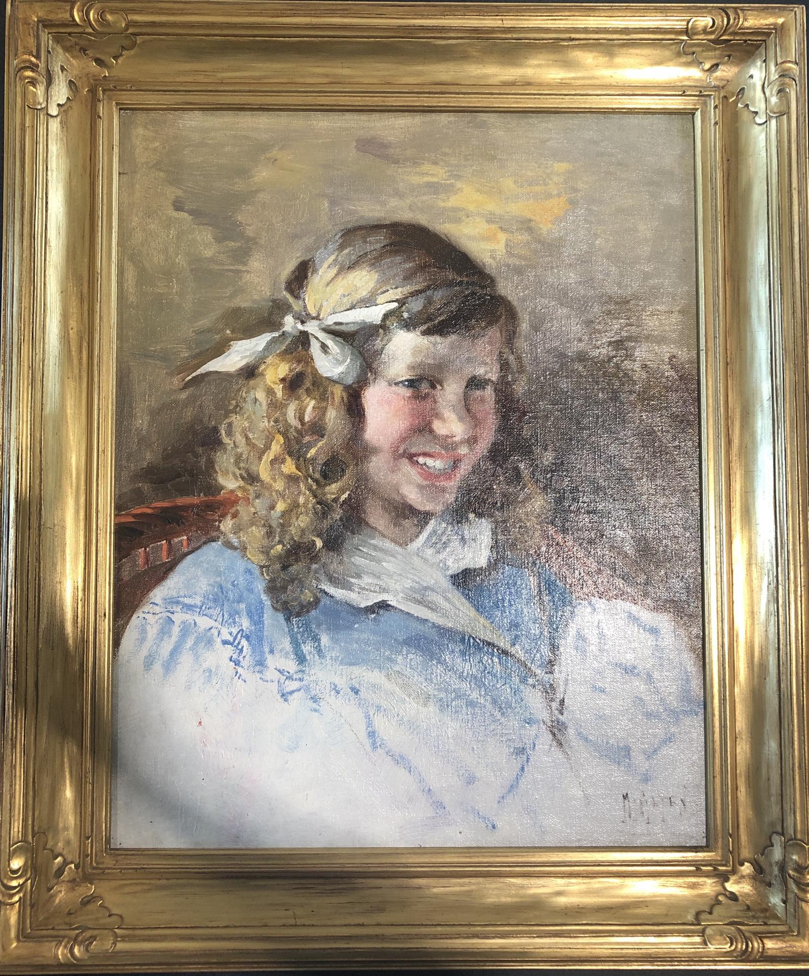 Portrait of a young girl with curly hair and a bow.