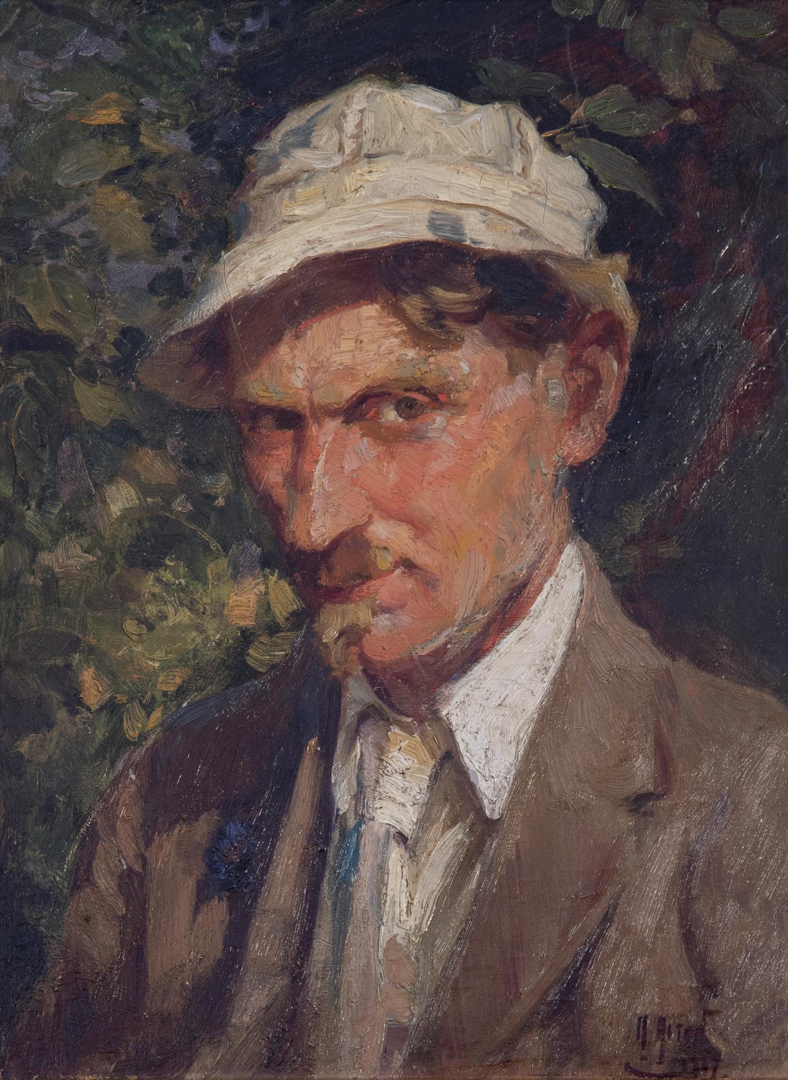 Self-portrait of a man wearing a brown jacket, tie, white shirt and white hat.