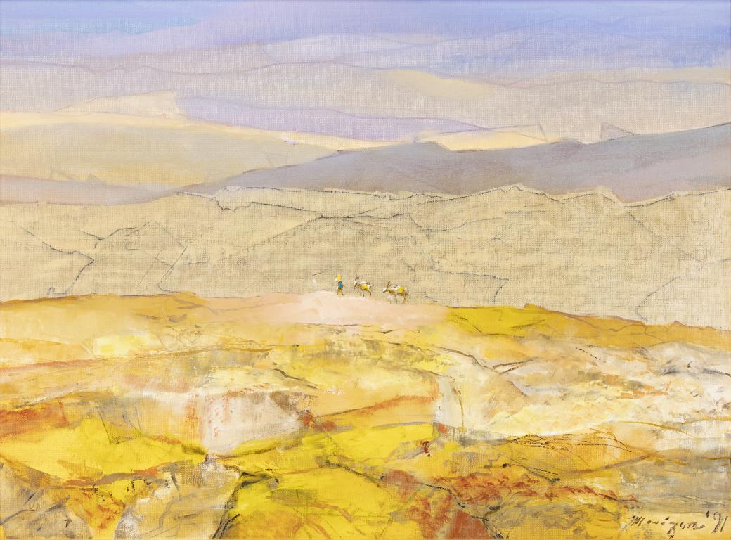 Landscape of yellow, blue and orange ridges and hills.