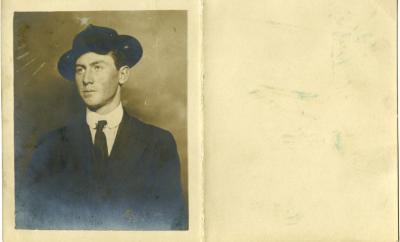 Untitled (Studio Portrait of a Man with Hat)