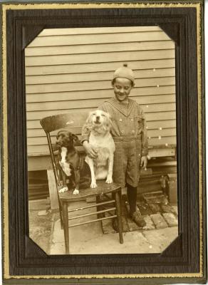 Untitled (Boy with his Dogs)