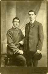 Untitled (Two Men Holding Military Hats)