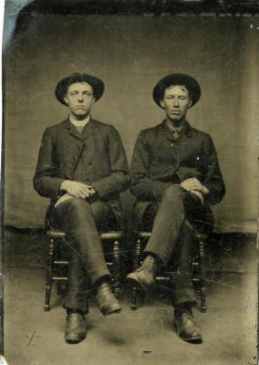 Untitled (Two Men with Legs Crossed)