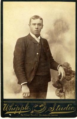 Untitled (Young Man with Hand on Chair)