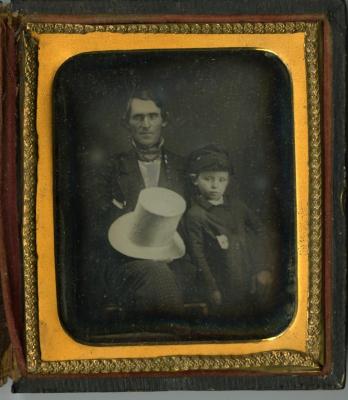 Untitled (Portrait of Man with Hat and Young Boy)