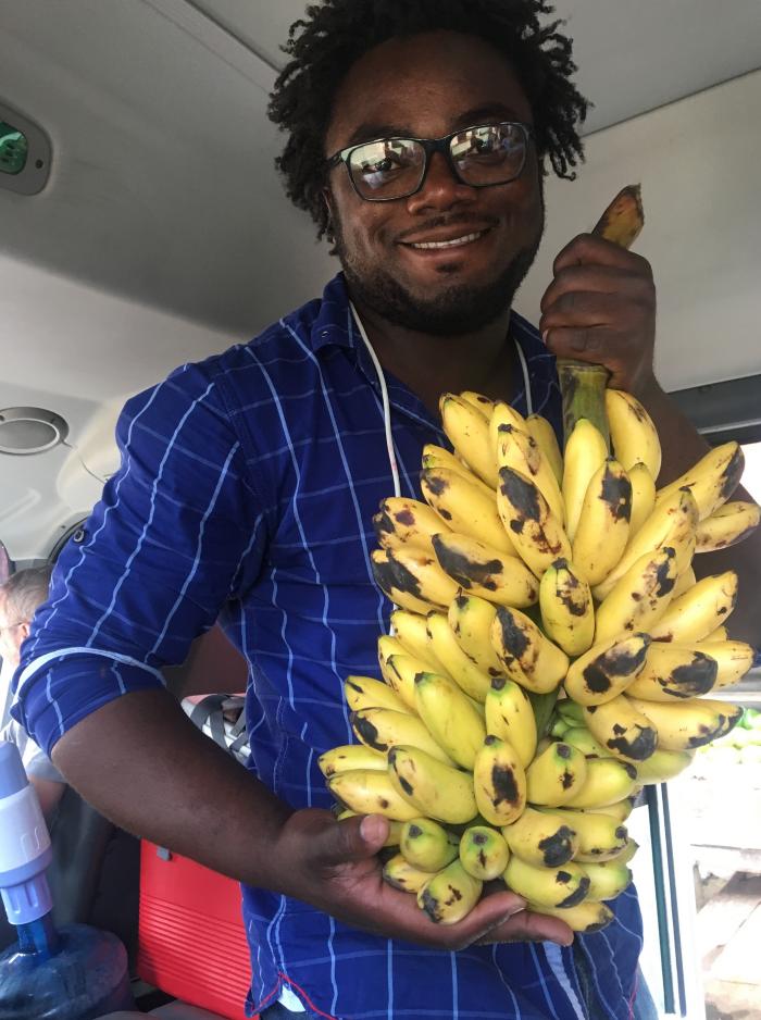 Romel Jean-Pierre with local produce from Haiti