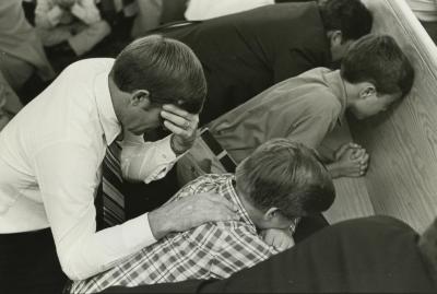 Father and Sons Kneeling in Prayer, Georgia 