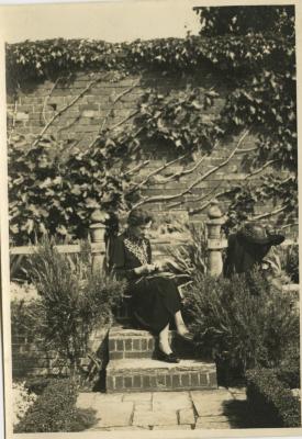 Untitled (Portrait of Woman Knitting on Stairs)