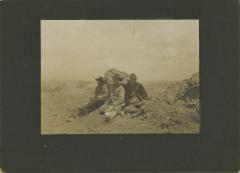 Untitled (Three Men Leaning Against Rock)