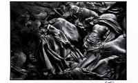 A mass grave. The bodies of Rwandan Hutu refugees who have died of cholera lie in a mass grave on the border between Rwanda and Zaire, near Goma, Zaire, shortly after the Rwandan genocide
