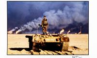 An American soldier stands on top of a destroyed Iraqi tank. Kuwaiti oil wells, ignited by Saddam&#039;s retreating forces, burn in the distance, Kuwait