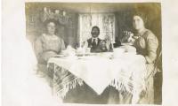 Untitled (Three People Around Table) 