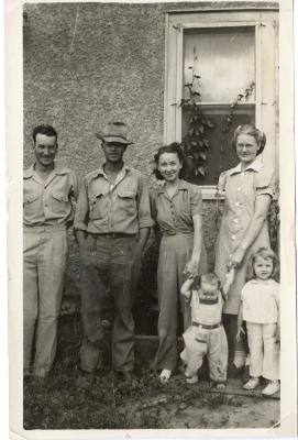 Untitled (Four People and Two Children Outside of Building) 