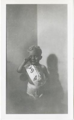 Untitled (Young Boy Wearing Sash) 