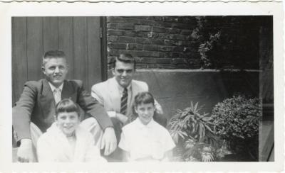 Untitled (Two Men and Two Girls on Steps) 