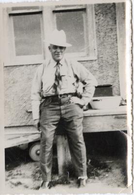 Untitled (Man Leaning on Table) 