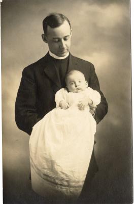 Untitled (Portrait of Man Holding Baby) 