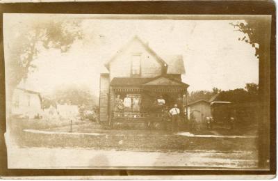 Untitled (People on the Porch of a House) 