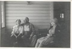 Untitled (Two Women and One Man Sitting Together)