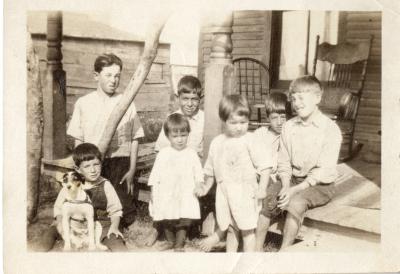 Untitled (Seven Children and a Dog on a Porch)