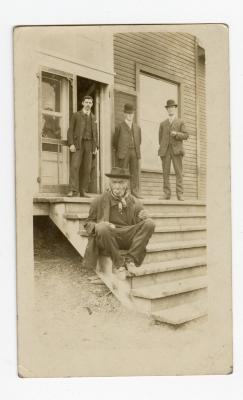 Untitled (Four Men on Steps of Building) 