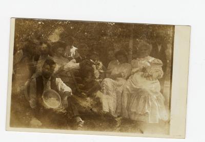 Untitled (Group Sitting Outside) 