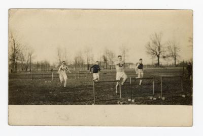 Untitled (Four Men running toward Hurdles) 