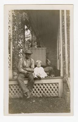 Untitled (Man, Baby, and Dog on Porch) 