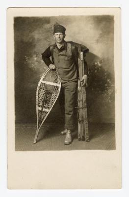 Untitled (Man with snowshoe and gear)