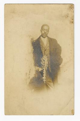 Untitled (Faded Portrait of a Man in a Suit)