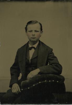 Untitled (Portrait of Young Boy with Chair)