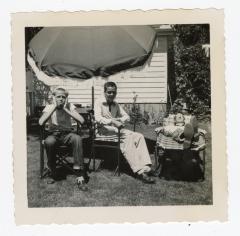 Untitled (Three Boys Under Umbrella) 